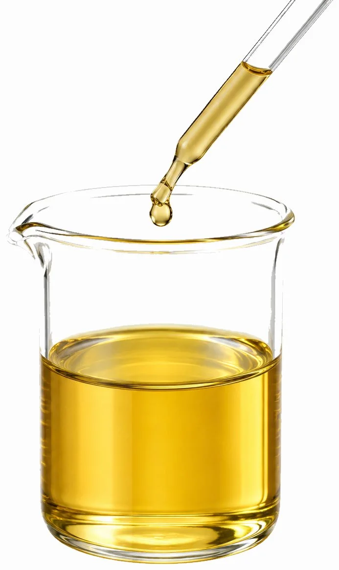 Carrier oil dispensed from a glass dropper into a lab beaker